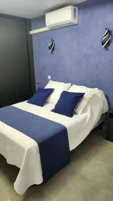 Un ou plusieurs lits dans un hébergement de l'établissement Location Bastia, U Fiumicellu. Vue Mer. Jacuzzi, Barbecue,... Pour 2 personnes