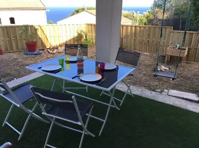 Jardin de l'établissement F2 REZ DE VILLA ENTRE MER ET MONTAGNE