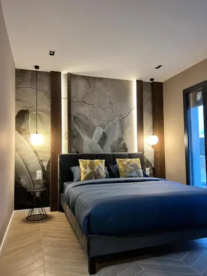 Un ou plusieurs lits dans un hébergement de l'établissement Villa Valentin 2 chambres avec piscine chauffé à Calvi