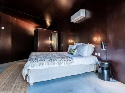 Un ou plusieurs lits dans un hébergement de l'établissement Villa Casa Suttana by Interhome