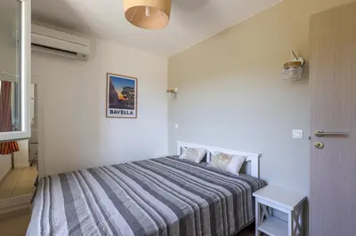 Un ou plusieurs lits dans un hébergement de l'établissement Maison Fab & Jo - Proche de lîle rousse