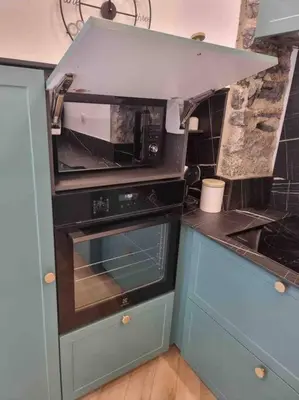 Cuisine ou kitchenette dans l'établissement Appartement au cœur de la ville