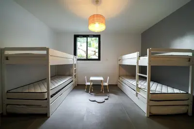 Un ou plusieurs lits dans un hébergement de l'établissement Très belle villa à Ghisonaccia avec piscine chauffée