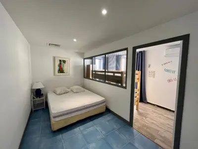 Un ou plusieurs lits dans un hébergement de l'établissement Appartement de standing au port climatisé, centre-ville, proche plage et commerces