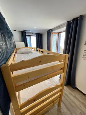 Un ou plusieurs lits dans un hébergement de l'établissement Appartement de standing au port climatisé, centre-ville, proche plage et commerces