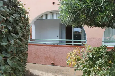 Jardin de l'établissement Grazioso bilocale a 200 m dal mare in residence con piscina e WI-FI