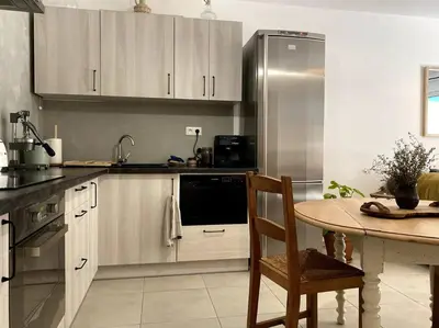 Cuisine ou kitchenette dans l'établissement Bord de mer, 2 chambres