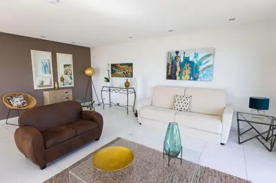 Coin salon dans l'établissement Appartement Azzurra