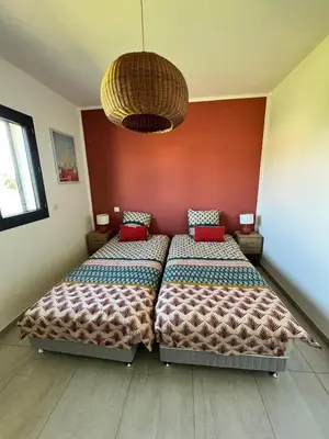 Un ou plusieurs lits dans un hébergement de l'établissement Casa Lamaghjone - Villa T4 avec piscine chauffée à 3,5km de la mer