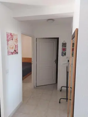 Un ou plusieurs lits dans un hébergement de l'établissement NOUVEL LOCATION d'un Bel appart T2 climatisé et meublé au RDCh avec piscine dans residence les Melody