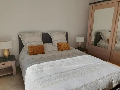 Un ou plusieurs lits dans un hébergement de l'établissement CAP CORSE VILLA VUE MER et MONTAGNE