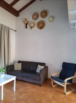 Coin salon dans l'établissement Studio mezzanine 4 personnes Linguizetta marine de Bravone Corse