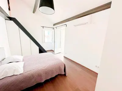 Un ou plusieurs lits dans un hébergement de l'établissement Magnifique duplex de 130 m² à Corte (centre ville)