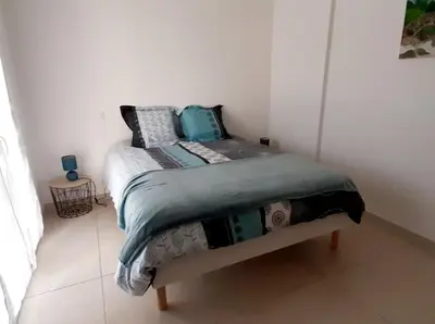 Un ou plusieurs lits dans un hébergement de l'établissement Bel appartement Corse côte Est