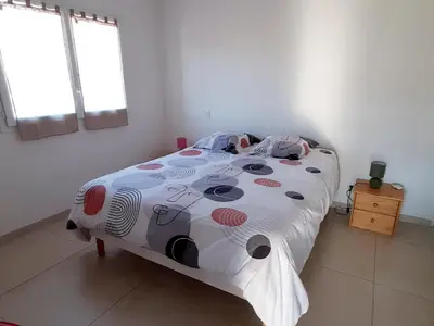 Un ou plusieurs lits dans un hébergement de l'établissement Bel appartement Corse côte Est