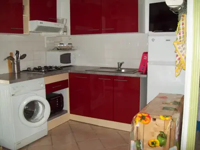Cuisine ou kitchenette dans l'établissement La Corse mer turquoise et sable fin