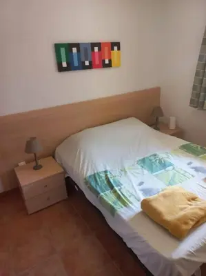 Un ou plusieurs lits dans un hébergement de l'établissement Appartement de vacances Marine de Bravone - Corse