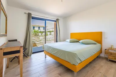 Un ou plusieurs lits dans un hébergement de l'établissement Villa Lurenzu - Maison pour 8 avec piscine