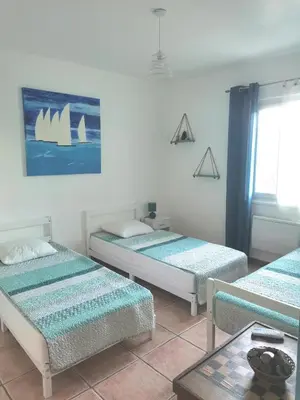 Un ou plusieurs lits dans un hébergement de l'établissement Rez Haut de villa à Calenzana
