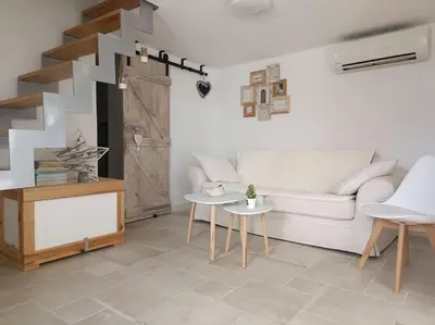 Coin salon dans l'établissement Maison de charme proche Bastia