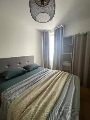Un ou plusieurs lits dans un hébergement de l'établissement Appartement F3 Corte, centre ville