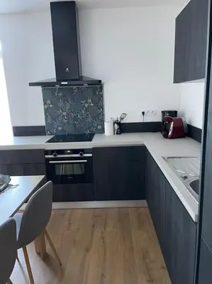 Cuisine ou kitchenette dans l'établissement Appartement F3 Corte, centre ville