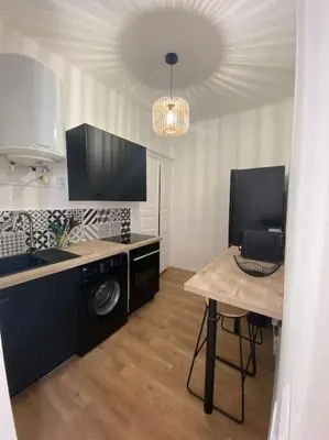Cuisine ou kitchenette dans l'établissement Corte magnifique T2 45m2 neuf 5 personnes place st marcel hyper centre wifi lave linge tv
