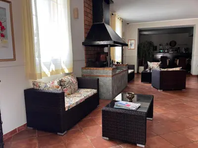 Coin salon dans l'établissement Hotel Du Vignoble