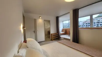 Un ou plusieurs lits dans un hébergement de l'établissement Appartement sur la baie, en centre ville