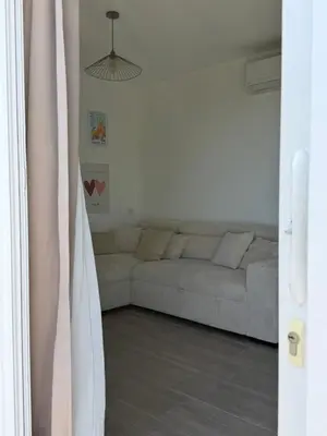 Coin salon dans l'établissement Logement entier vue mer