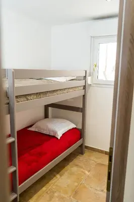 Un ou plusieurs lits dans un hébergement de l'établissement A Suara Di Mare