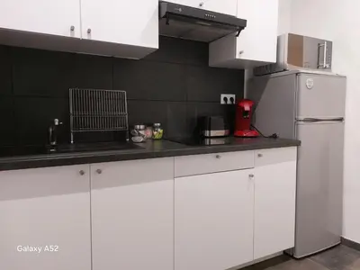 Cuisine ou kitchenette dans l'établissement studio gabriel