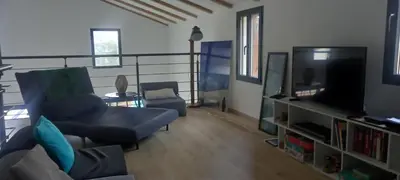 Télévision ou salle de divertissement dans l'établissement Maison neuve Vue imprenable Piscine et spa