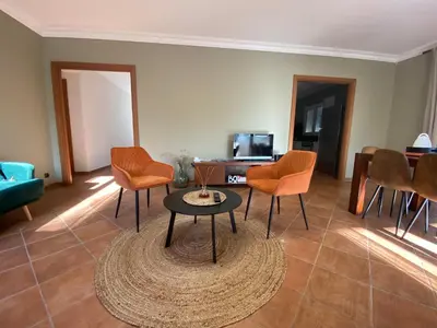 Coin salon dans l'établissement Appartements 300 mètres de la mer et villa