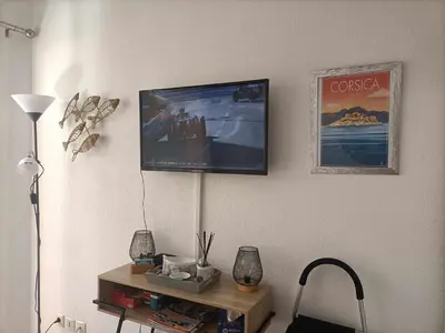 Télévision ou salle de divertissement dans l'établissement CORSALILA