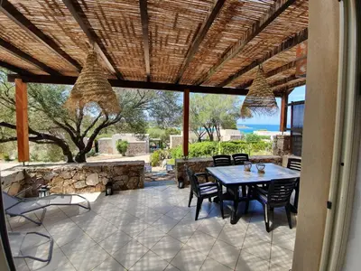Terrasse ou espace extérieur de l'établissement Appartamento 6 posti letto a 5 minuti dalla spiaggia