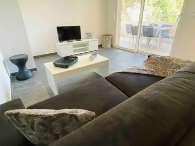 Télévision ou salle de divertissement dans l'établissement Monte Santu T2
