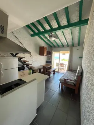 Cuisine ou kitchenette dans l'établissement RESIDENCE LA PLAGE Pieds dans l'eau Belle Vue mer