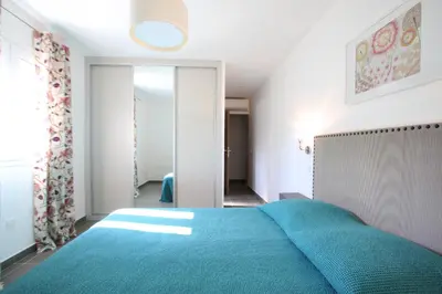 Un ou plusieurs lits dans un hébergement de l'établissement Residence Catherine