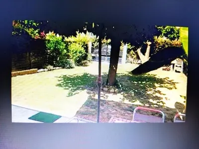 Jardin de l'établissement Agréable villa 100 m de la plage
