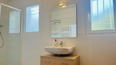 Salle de bains dans l'établissement Appartement Le Domaine L'ILE ROUSSE