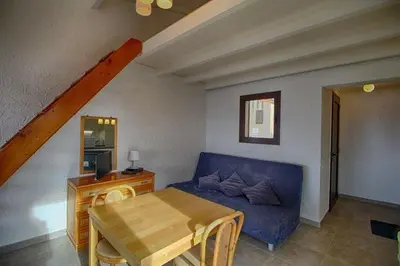 Coin salon dans l'établissement Appartement DOLCE 9 Lumio
