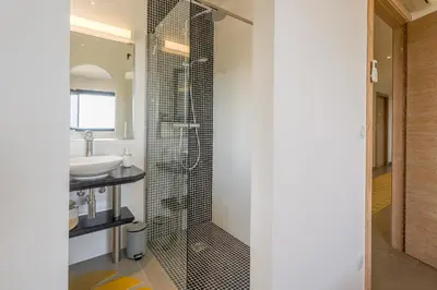 Salle de bains dans l'établissement Villa Ghjunchitu - Vue mer et Piscine privée proche de l'ile rousse