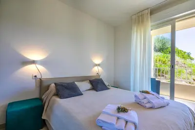 Un ou plusieurs lits dans un hébergement de l'établissement Residence A Marina