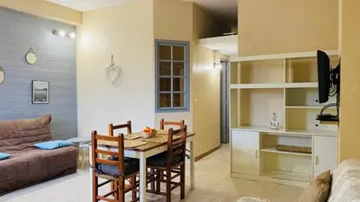 Coin salon dans l'établissement Appartement T2 Porto Ambroggio 35 LUMIO