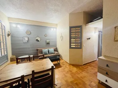 Coin salon dans l'établissement Appartement T2 Porto Ambroggio 35 LUMIO