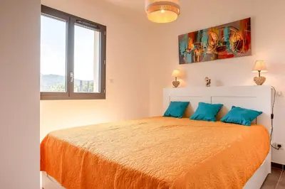 Un ou plusieurs lits dans un hébergement de l'établissement Stella di Luce - Appt climatisé vue mer