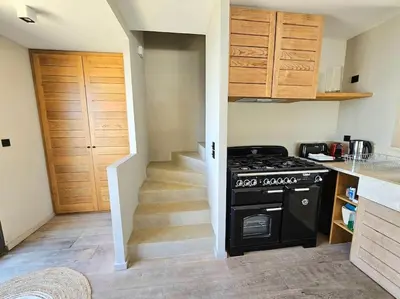 Cuisine ou kitchenette dans l'établissement Villa prestige au bord de l'eau- Misincu