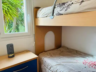 Un ou plusieurs lits dans un hébergement de l'établissement Appartement Boug 26 Lumio