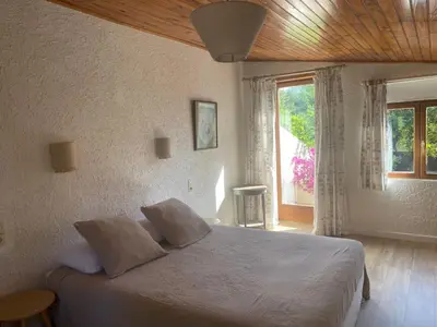 Un ou plusieurs lits dans un hébergement de l'établissement Maison à 150m de la plage naturiste, 2 chambres